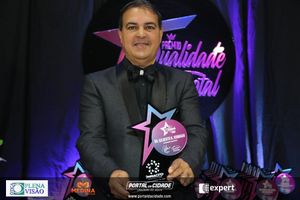 Pr&ecirc;mio qualidade Total da Empesa Impacto