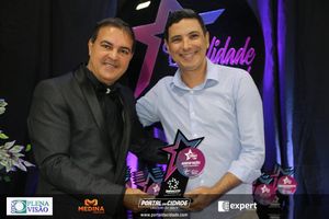 Pr&ecirc;mio qualidade Total da Empesa Impacto