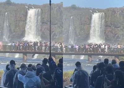 Brasileiro foi flagrado pulando da passarela pr&oacute;ximo &agrave; Garganta do Diabo ap&oacute;s deixar o aparelho cair. Ap&oacute;s a a&ccedil;&atilde;o, ele foi retirado do parque.