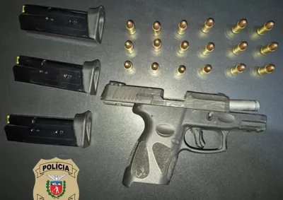 Pistola 9mm e muni&ccedil;&otilde;es foram arrecadadas em mandado de busca; armamento teria sido utilizado para amea&ccedil;ar v&iacute;tima.