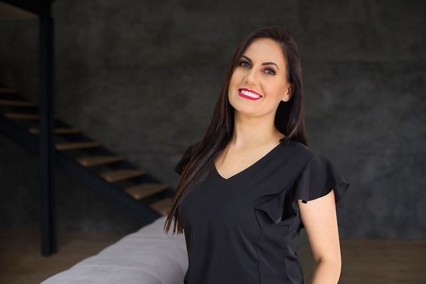 Emanuelle Teixeira Reis, s&oacute;cia propriet&aacute;ria da Teixeira Im&oacute;veis