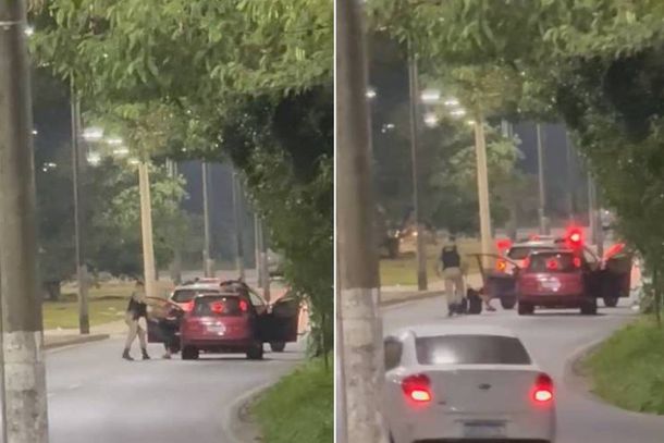 Mesmo sem esbo&ccedil;ar qualquer rea&ccedil;&atilde;o, submisso e dominado, um dos ocupantes do autom&oacute;vel &eacute; agredido com chutes pelo policial militar 